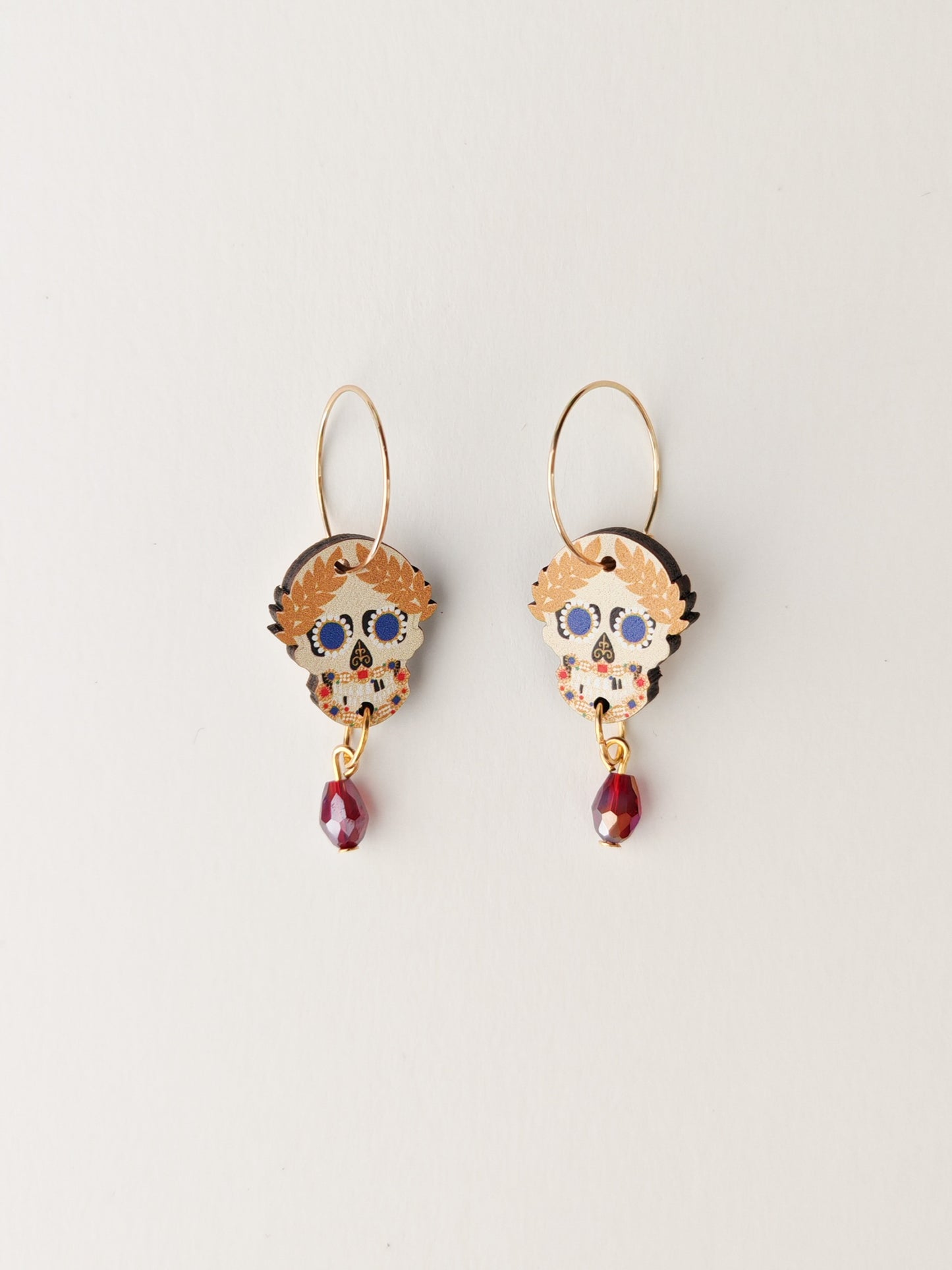 skull relic earrings purple beads NO FAULTS
