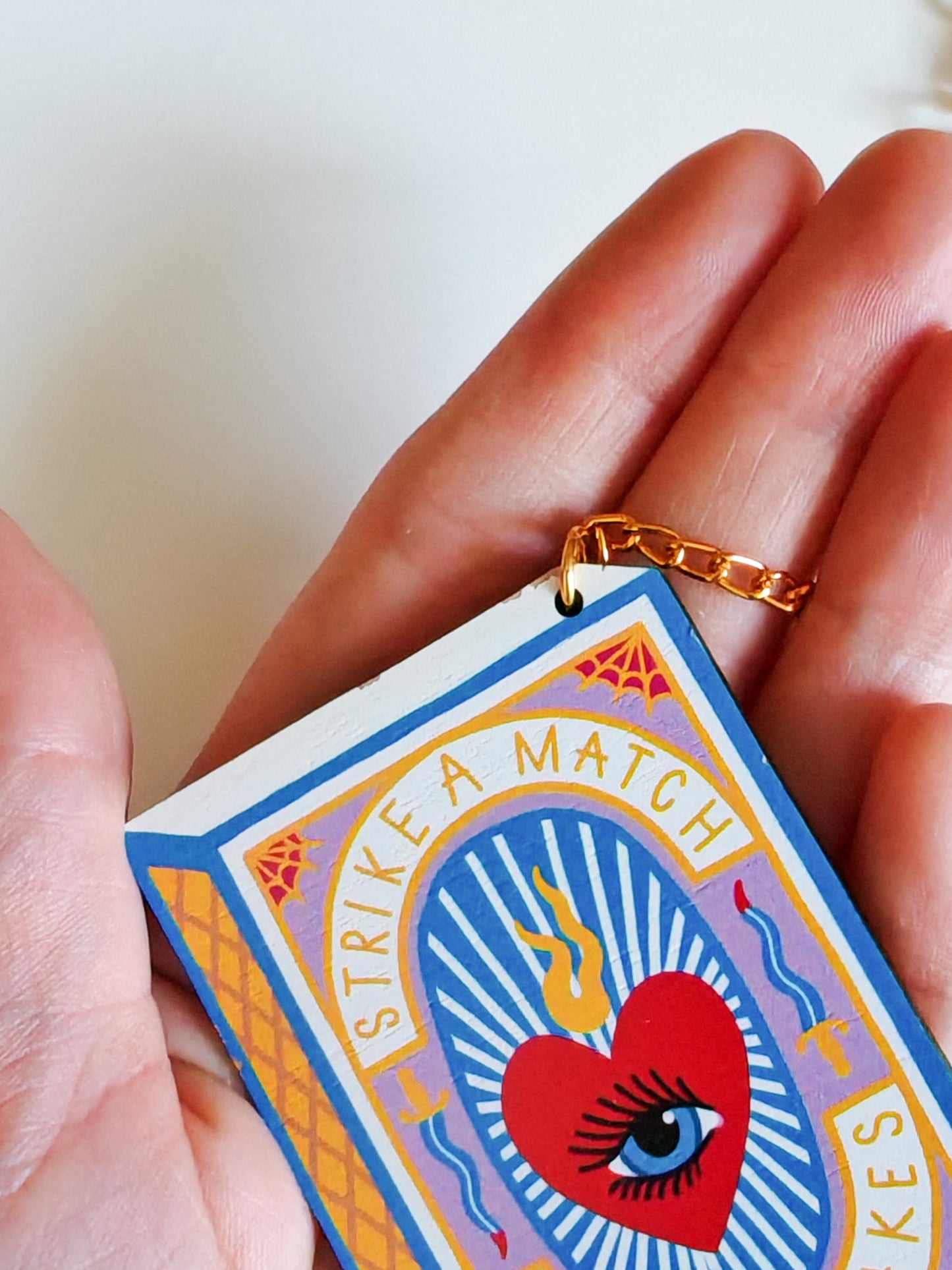 matchbox necklace PAINT CHIP / FAULT ON BACK