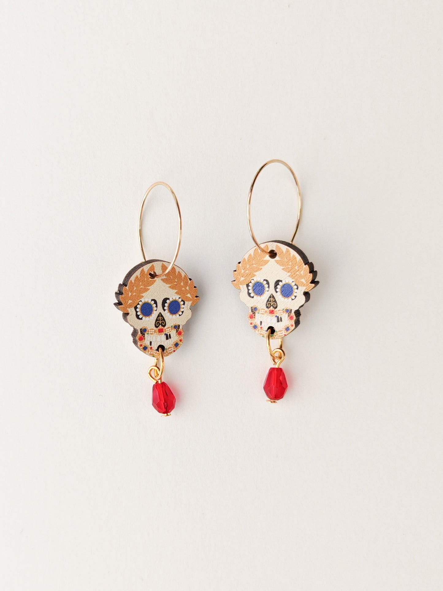 skull relic earrings transparent red beads NO FAULTS