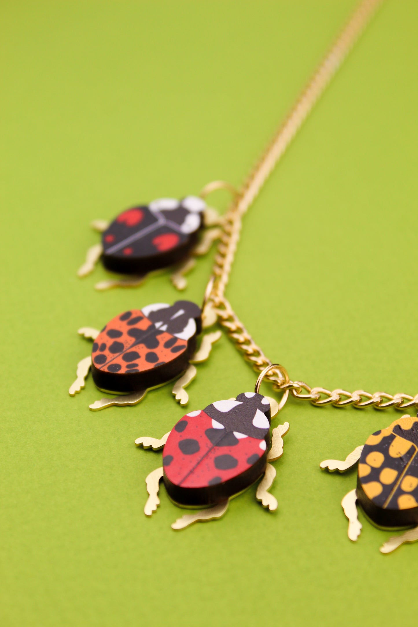 Collier à breloques coccinelle