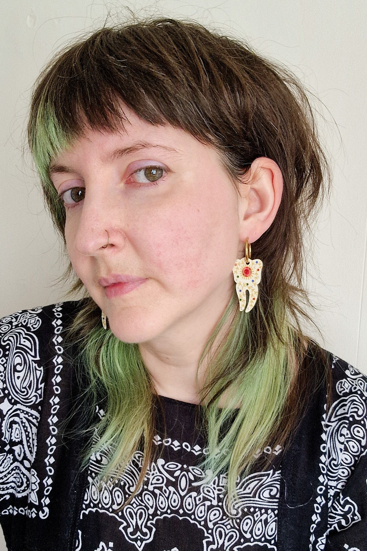 Boucles d'oreilles dents scintillantes