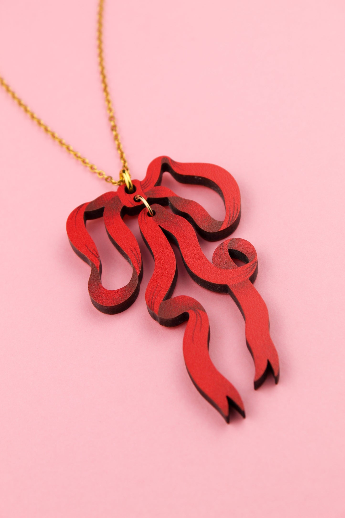 Pendentif noeud rouge