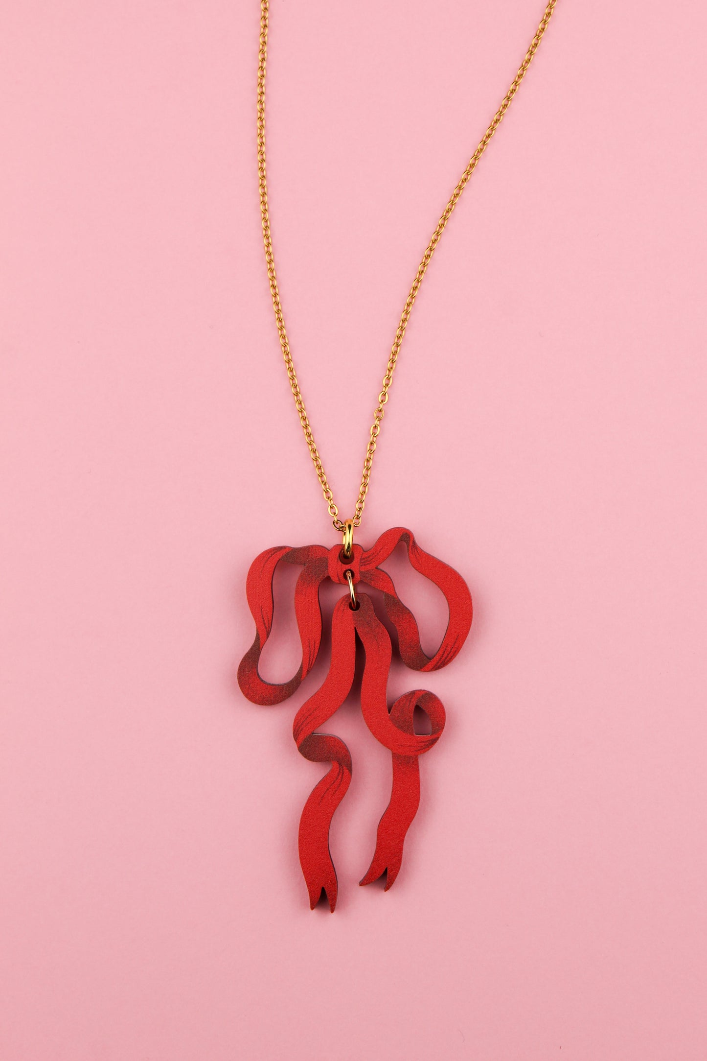 Pendentif noeud rouge