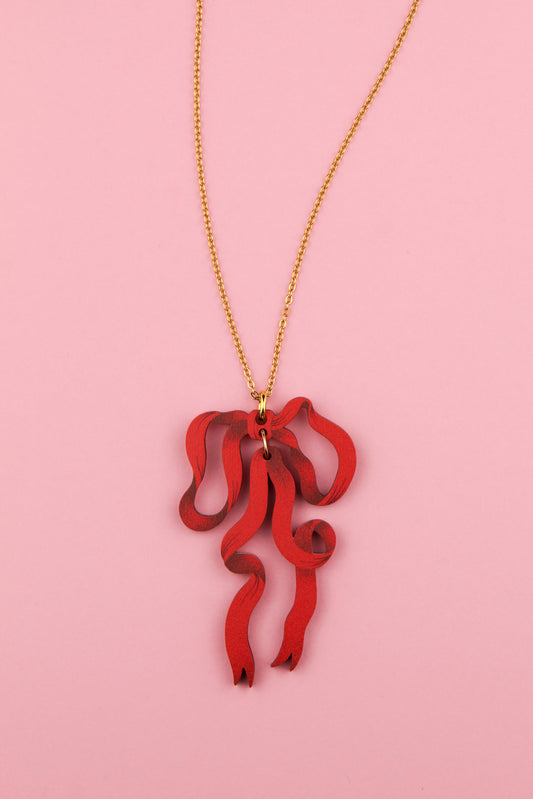 Pendentif noeud rouge